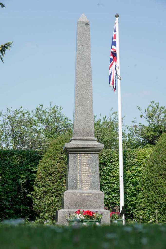 Portrait view of the war memorial and flag